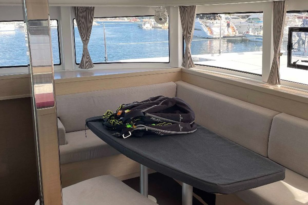Salon of Aventura, a Lagoon 42 OW catamaran at Ventimiglia, Italy