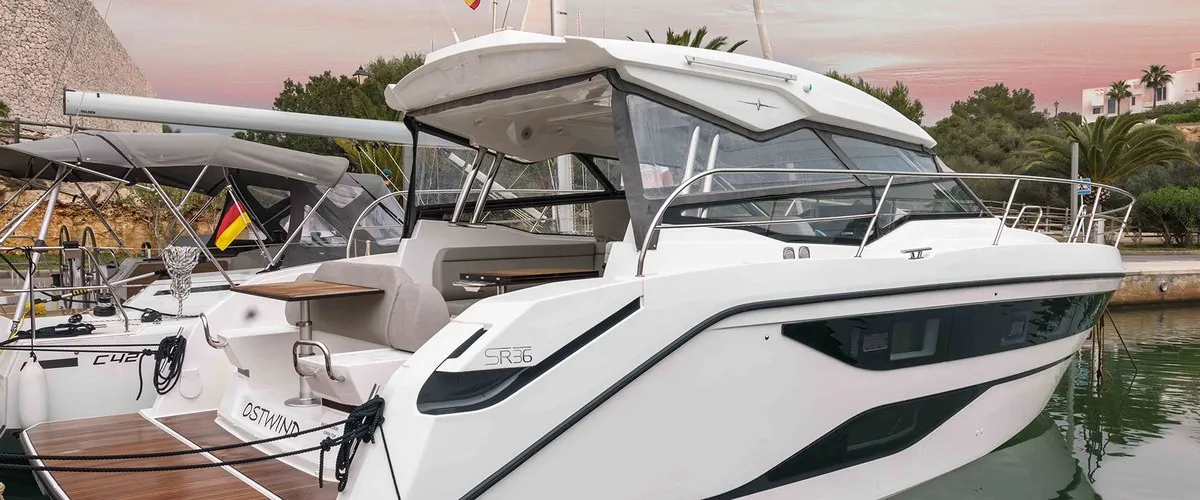 Exterior view of Ostwind, a Bavaria SR36 Open Top yacht at Cala Egos, Spain