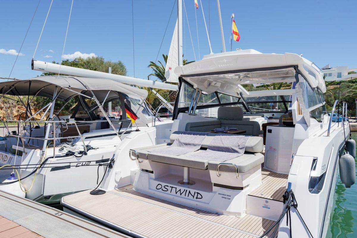 Exterior view of Ostwind, a Bavaria SR36 Open Top yacht at Cala Egos, Spain