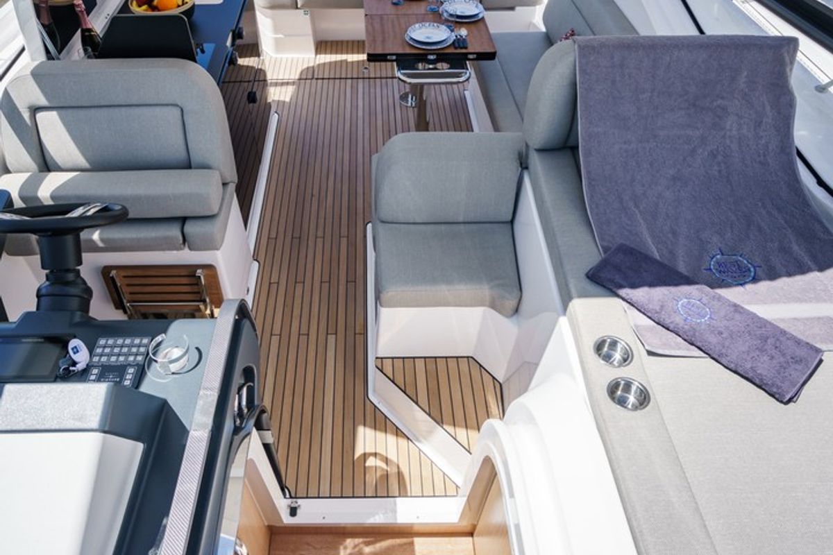 Deck of Ostwind, a Bavaria SR36 Open Top yacht at Cala Egos, Spain