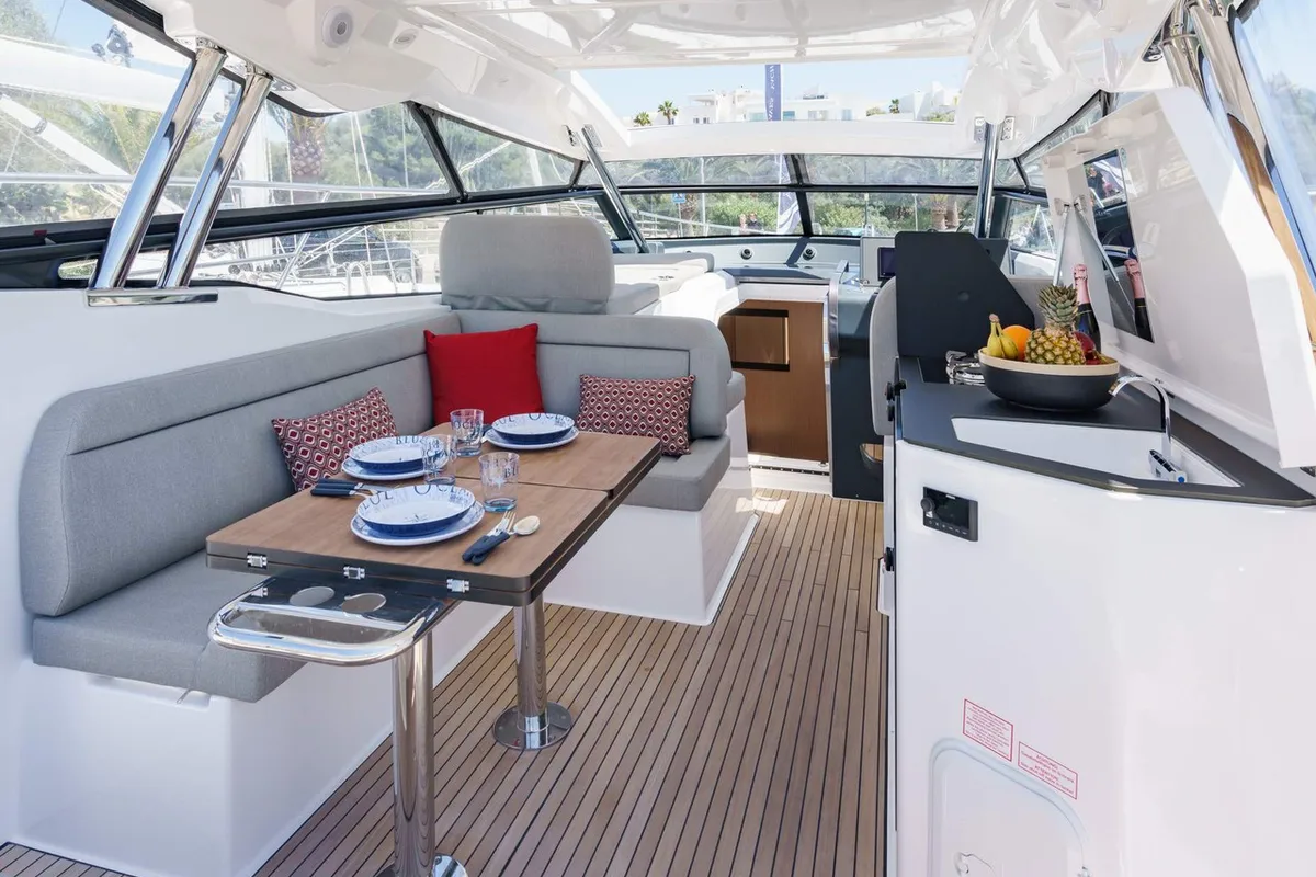 Deck of Ostwind, a Bavaria SR36 Open Top yacht at Cala Egos, Spain