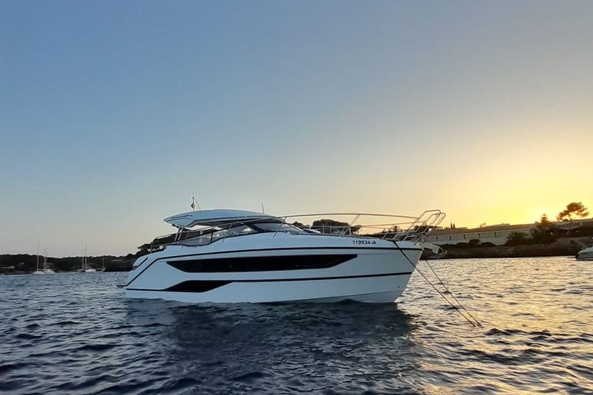 Exterior view of Ostwind, a Bavaria SR36 Open Top yacht at Cala Egos, Spain
