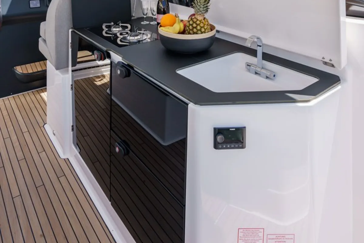 Ostwind, a Bavaria SR36 Open Top yacht at Cala Egos, Spain