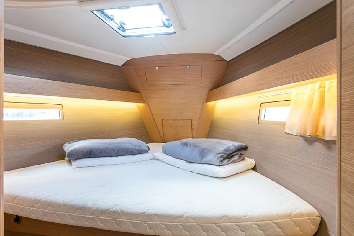 Cabin on Gavi, a Dufour 412 Grand large sailboat at Olbia, Italy