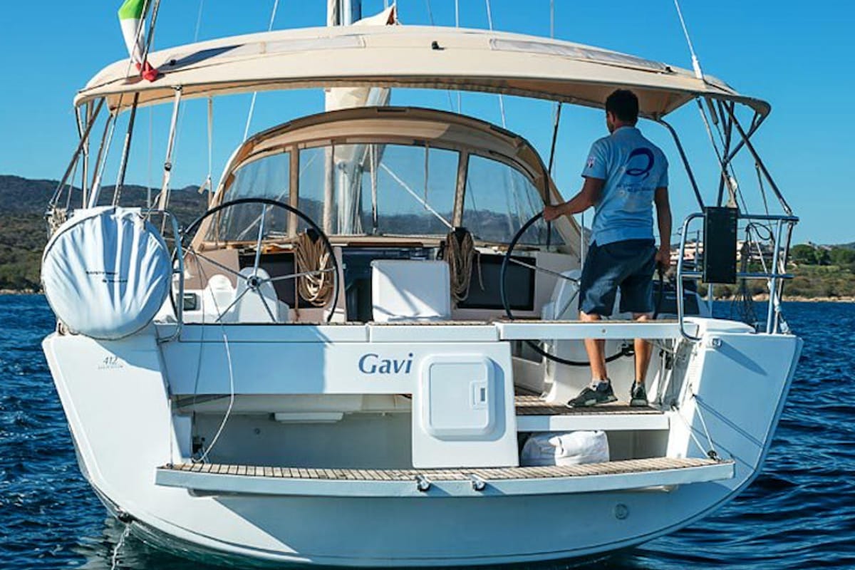 Exterior view of Gavi, a Dufour 412 Grand large sailboat at Olbia, Italy