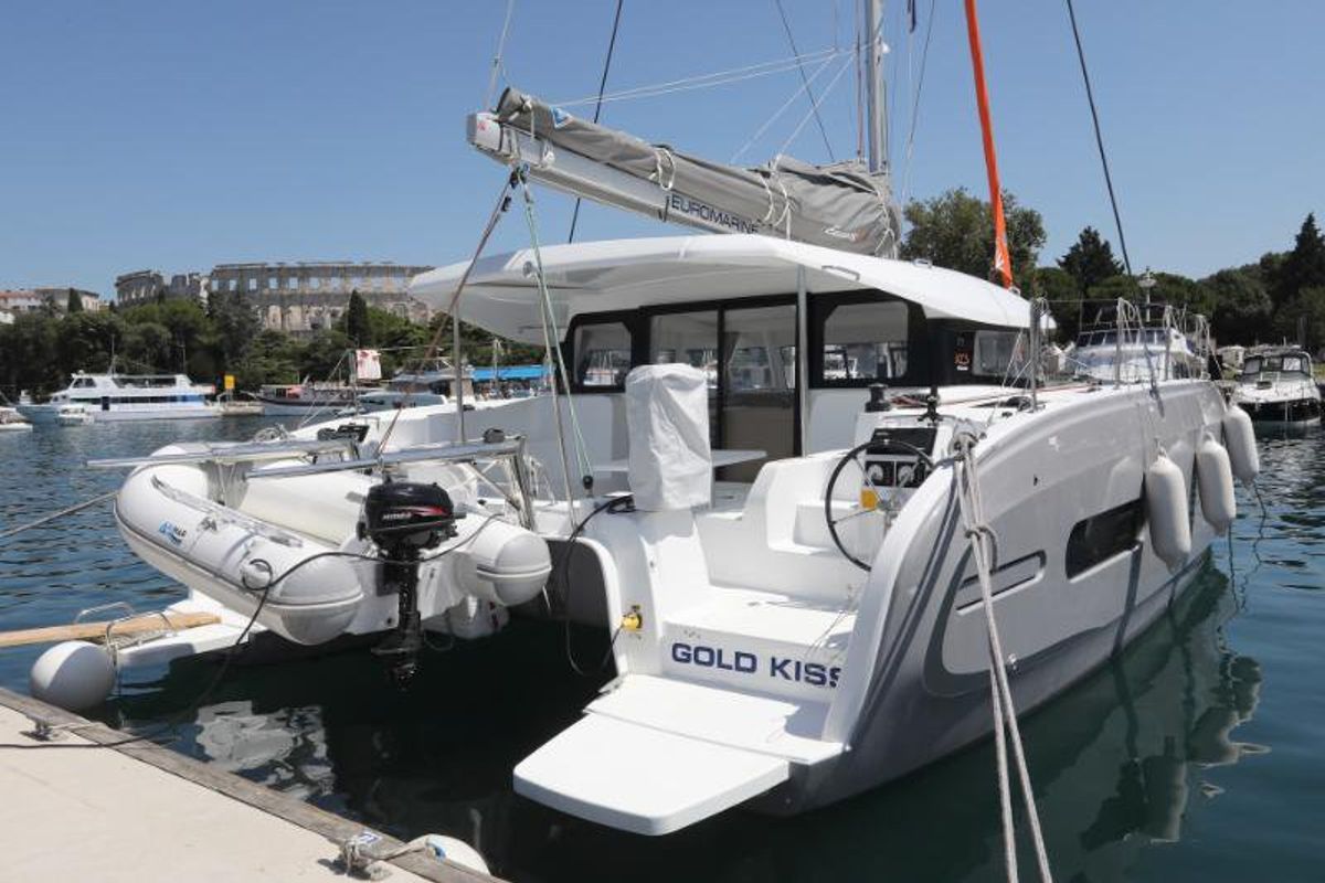 Exterior view of Gold Kiss, a Excess 11 - 4 + 1 + 1 cab. catamaran at Split, Croatia