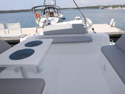 Deck of Gold Kiss, a Excess 11 - 4 + 1 + 1 cab. catamaran at Split, Croatia