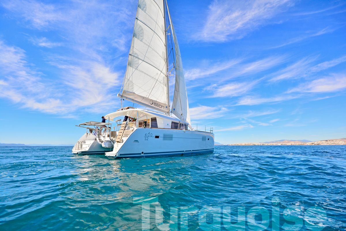 Exterior view of Turquoise, a Lagoon 400 S2 catamaran at Lavreotiki Municipal Unit, Greece