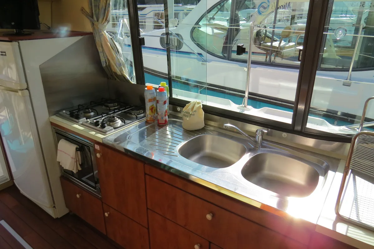 Galley of Maestro, a Nicols Estivale Quattro motorboat at Grez-Neuville, France