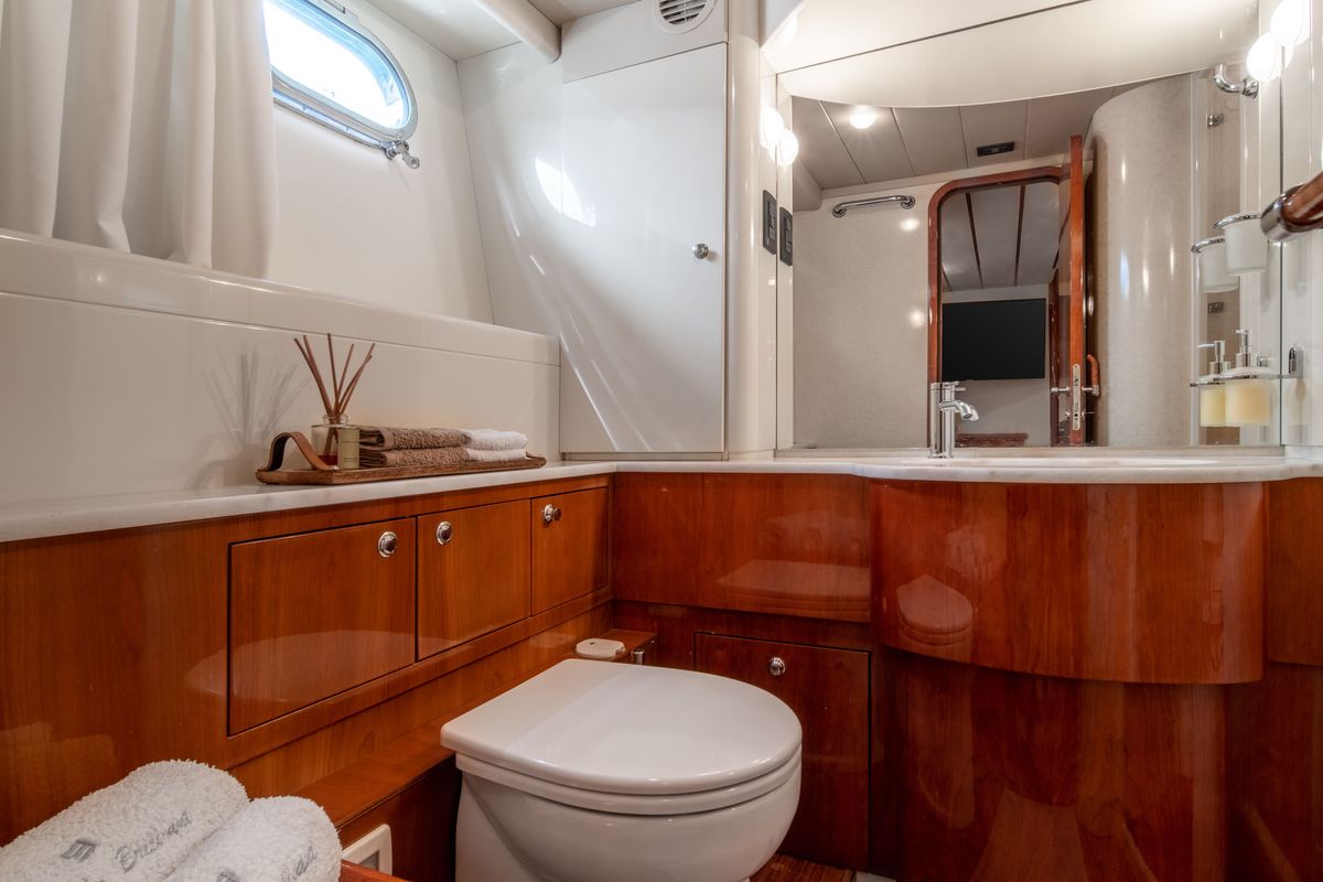 Head on SIMPLY BRILLIANT, a Ferretti 68 yacht at Ornos, Greece