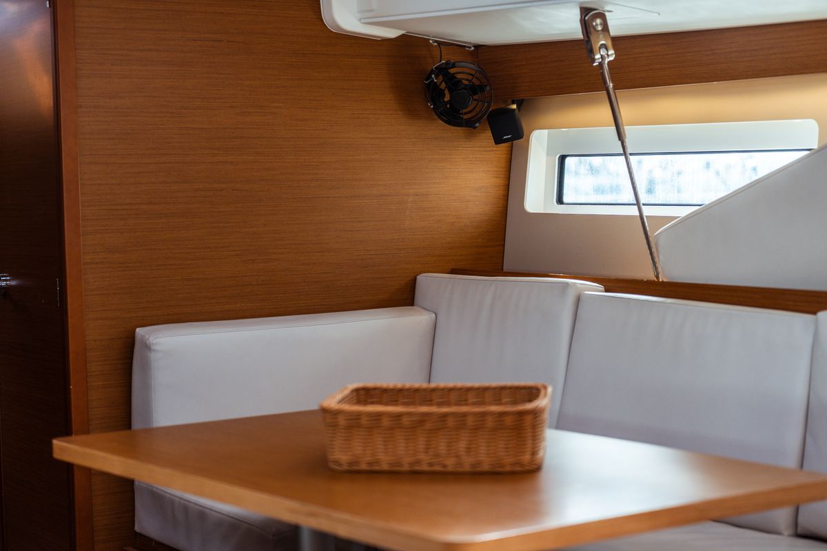 Salon of Aurora, a Jeanneau Sun Odyssey 490 sailboat at Olbia, Italy