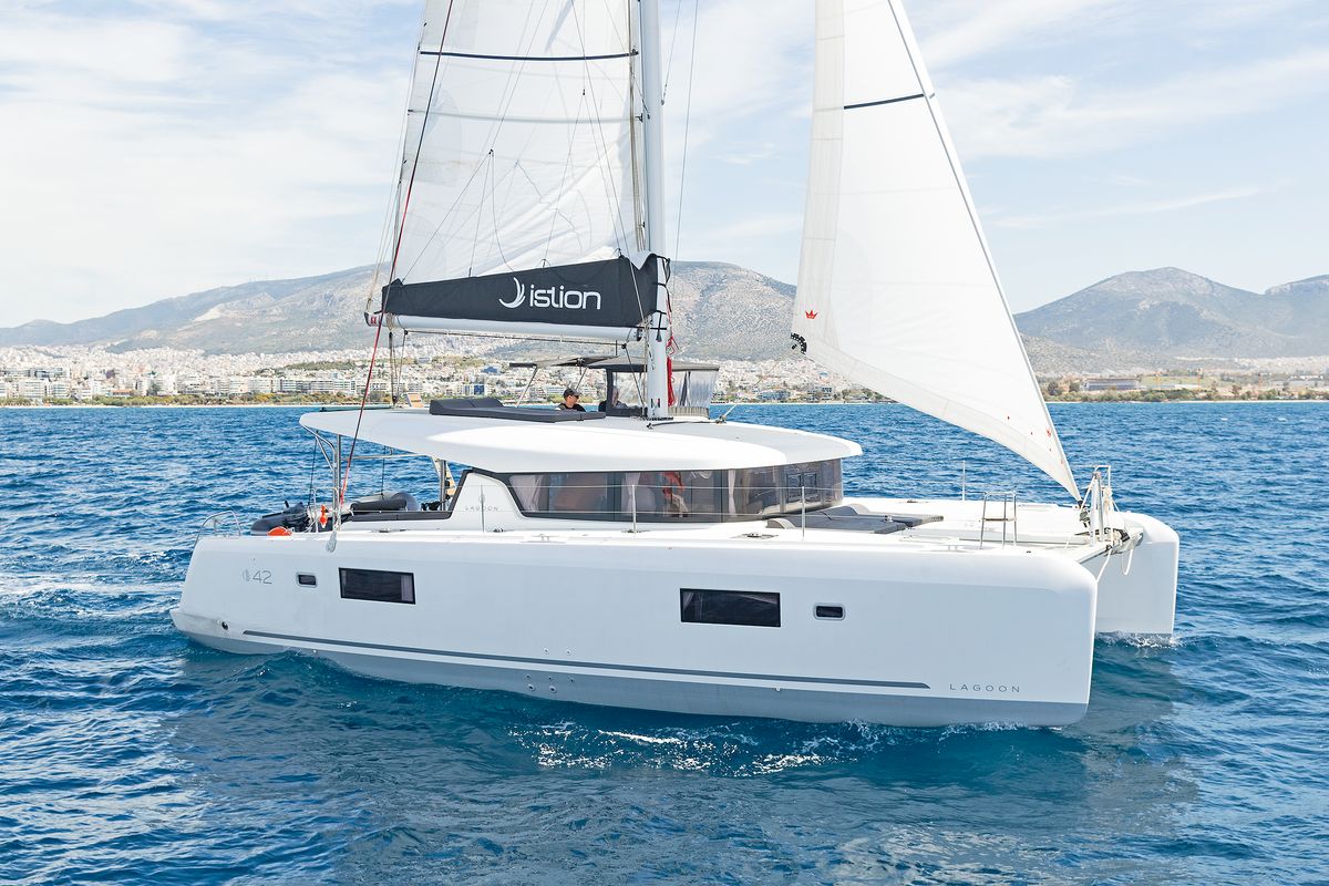 Exterior view of Playtime, a Lagoon 42 catamaran at Parikia, Greece
