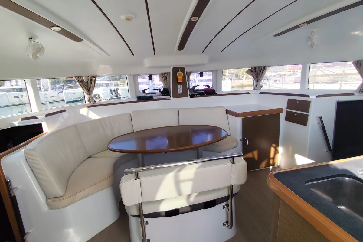 Salon of Whooper, a Lagoon 380 catamaran at Roses, Spain