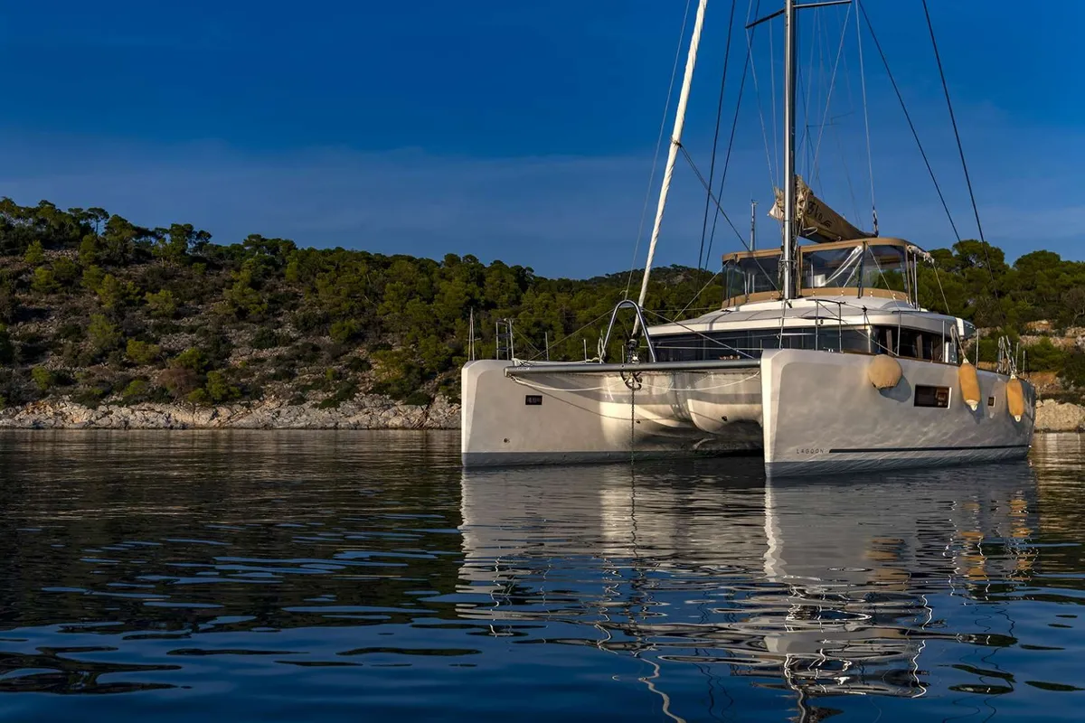 Flo, a Lagoon Lagoon 52F catamaran at Agios Stefanos, Greece