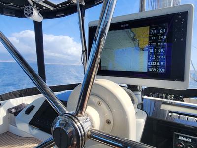 Cockpit of Tamiro, a Lagoon 52F catamaran at Municipal Unit of Lefkada, Greece