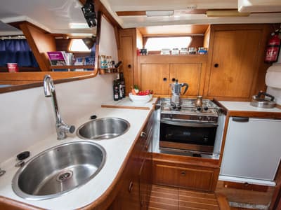 Galley of Asterias, a Wauquiez Amphitrite sailboat at Benitses, Greece