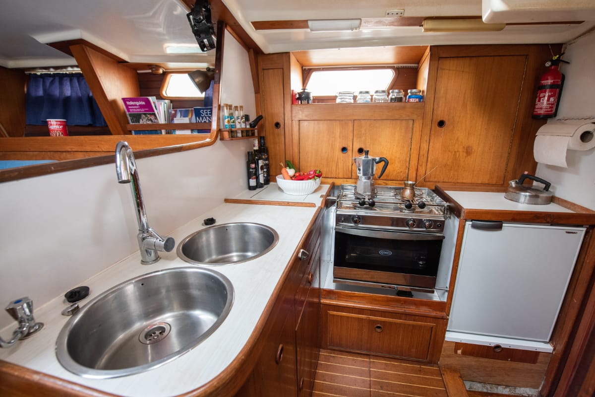 Galley of Asterias, a Wauquiez Amphitrite sailboat at Benitses, Greece