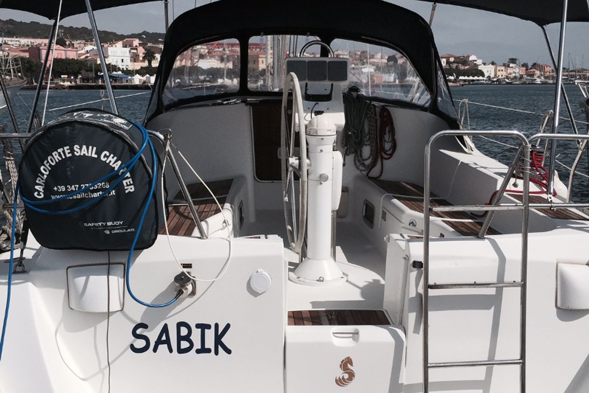 Cockpit of Sabik, a Beneteau Oceanis 393 sailboat at U Pàize/Carloforte, Italy