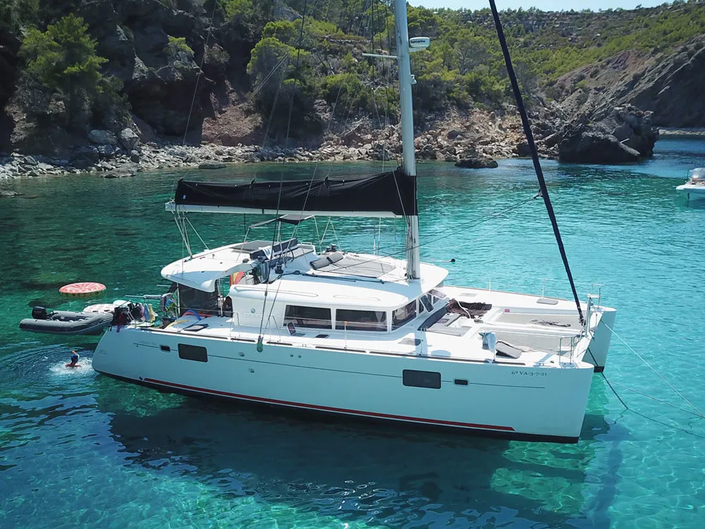 Exterior view of Gran Azul, a Lagoon 450 catamaran at Santa Eulària des Riu, Spain