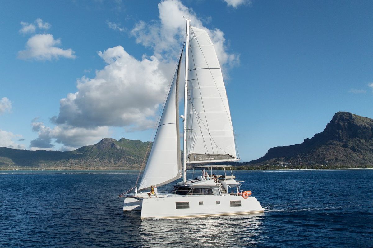 Exterior view of Sea Spirit III, a Nautitech Rochefort Nautitech 46 Fly catamaran at Grande Rivière Noire VCA, Mauritius