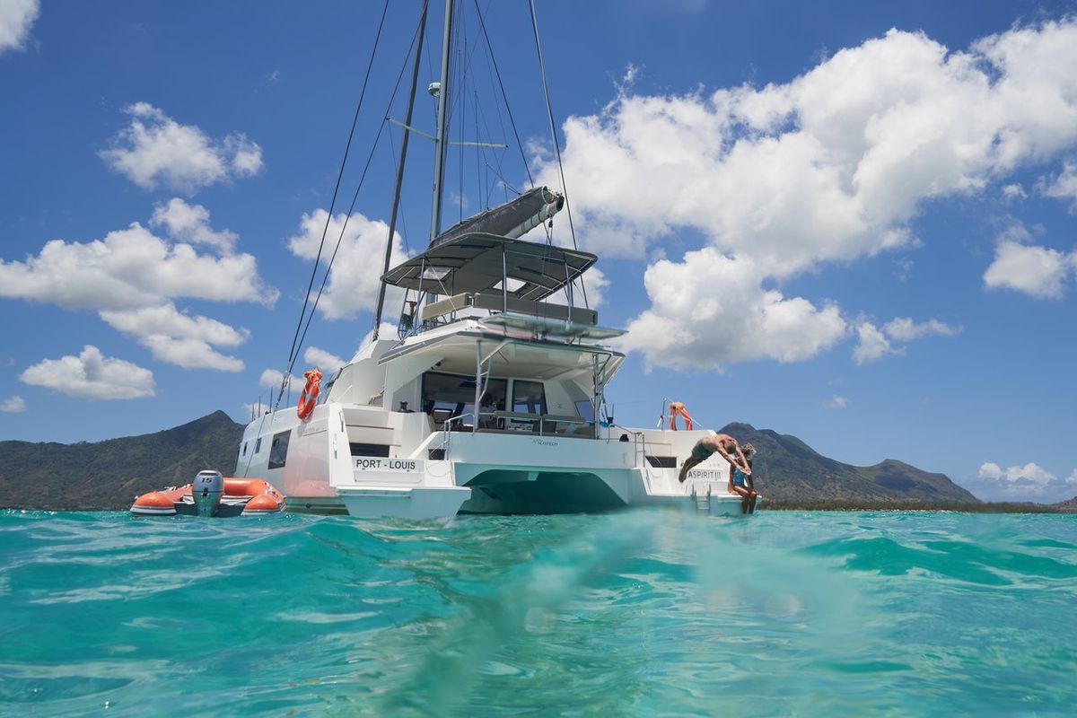 Exterior view of Sea Spirit III, a Nautitech Rochefort Nautitech 46 Fly catamaran at Grande Rivière Noire VCA, Mauritius