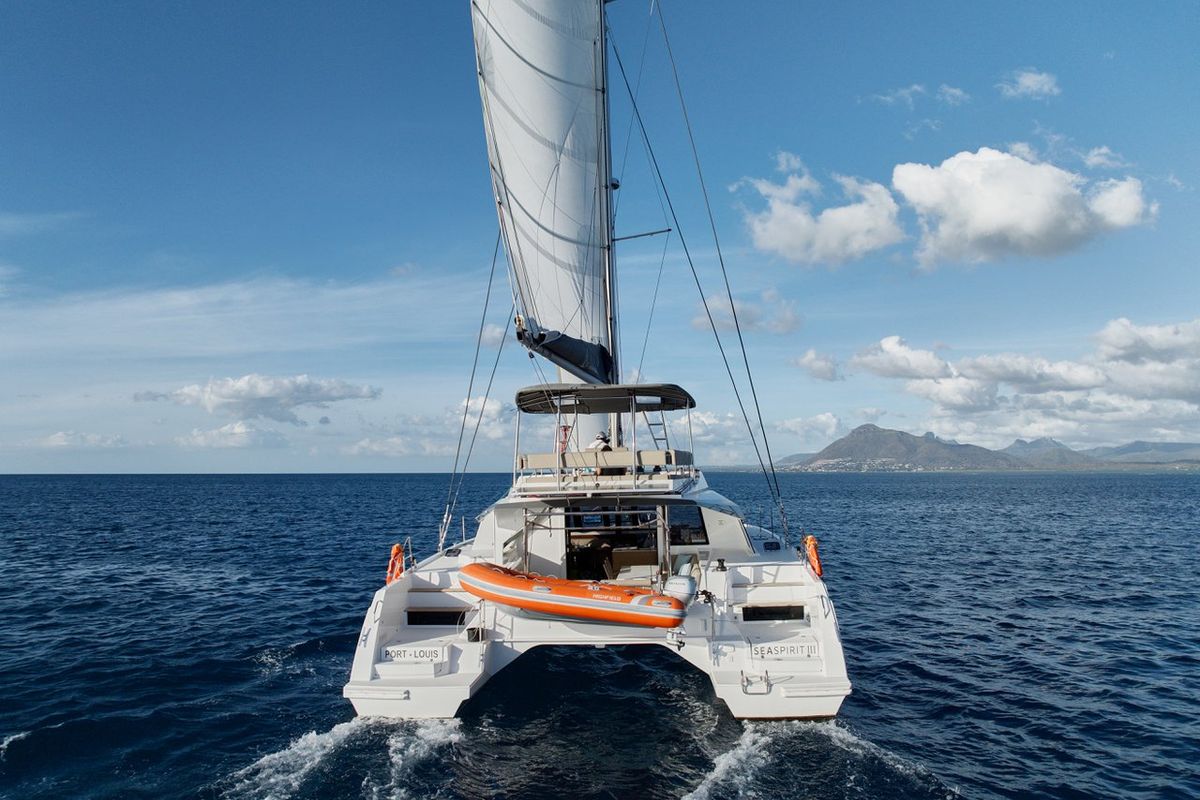 Exterior view of Sea Spirit III, a Nautitech Rochefort Nautitech 46 Fly catamaran at Grande Rivière Noire VCA, Mauritius