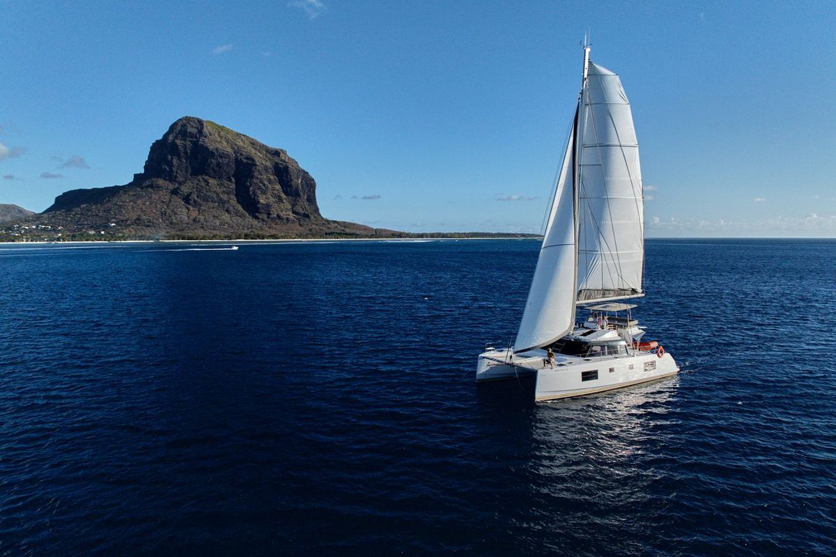 Exterior view of Sea Spirit III, a Nautitech Rochefort Nautitech 46 Fly catamaran at Grande Rivière Noire VCA, Mauritius