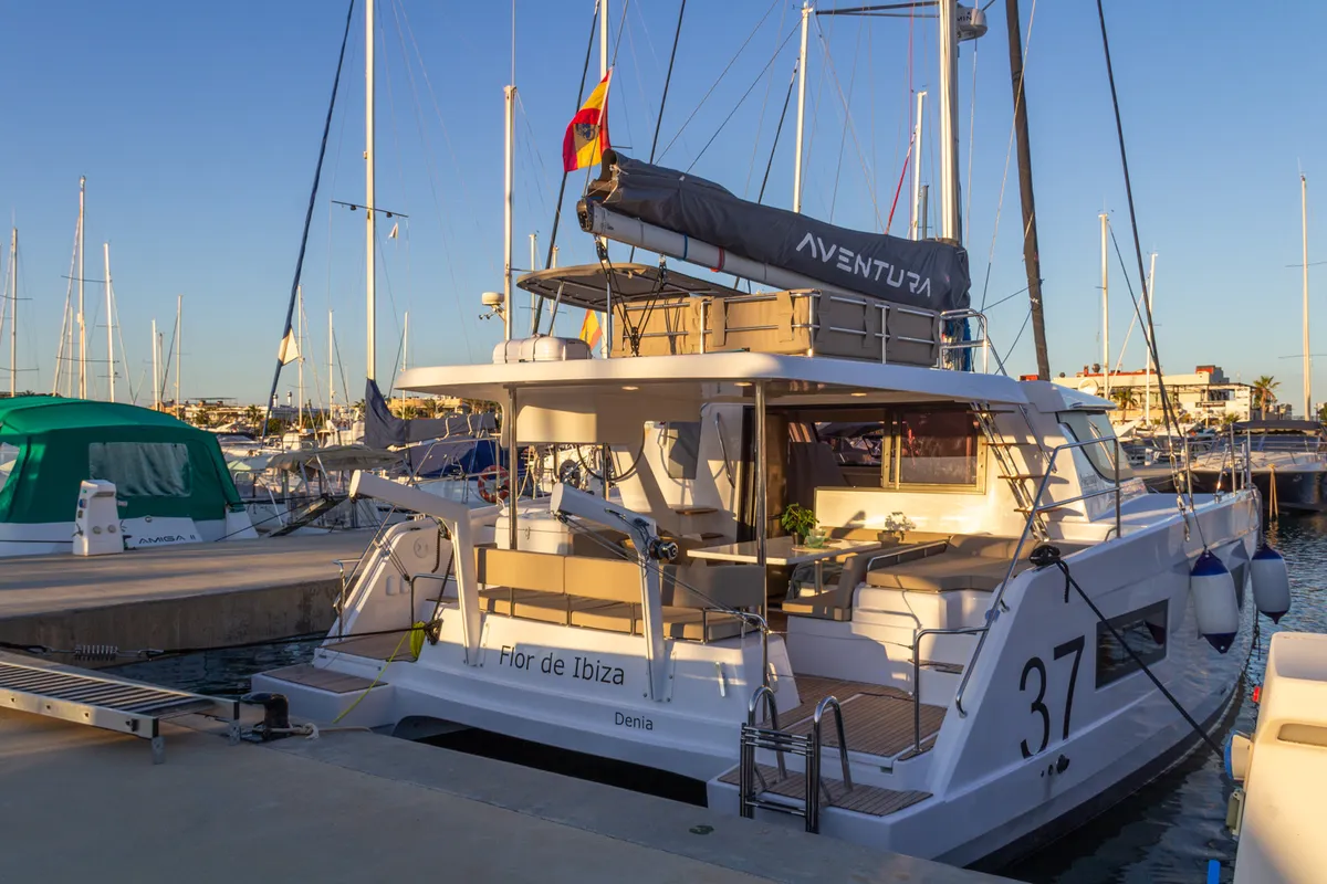 Exterior view of Flor de Ibiza, a Aventura Catamarans Aventura 37 catamaran at Dénia, Spain