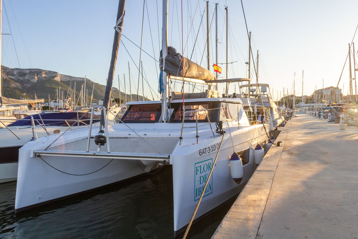 Exterior view of Flor de Ibiza, a Aventura Catamarans Aventura 37 catamaran at Dénia, Spain