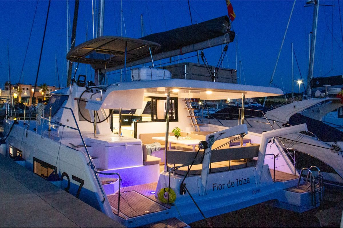 Exterior view of Flor de Ibiza, a Aventura Catamarans Aventura 37 catamaran at Dénia, Spain
