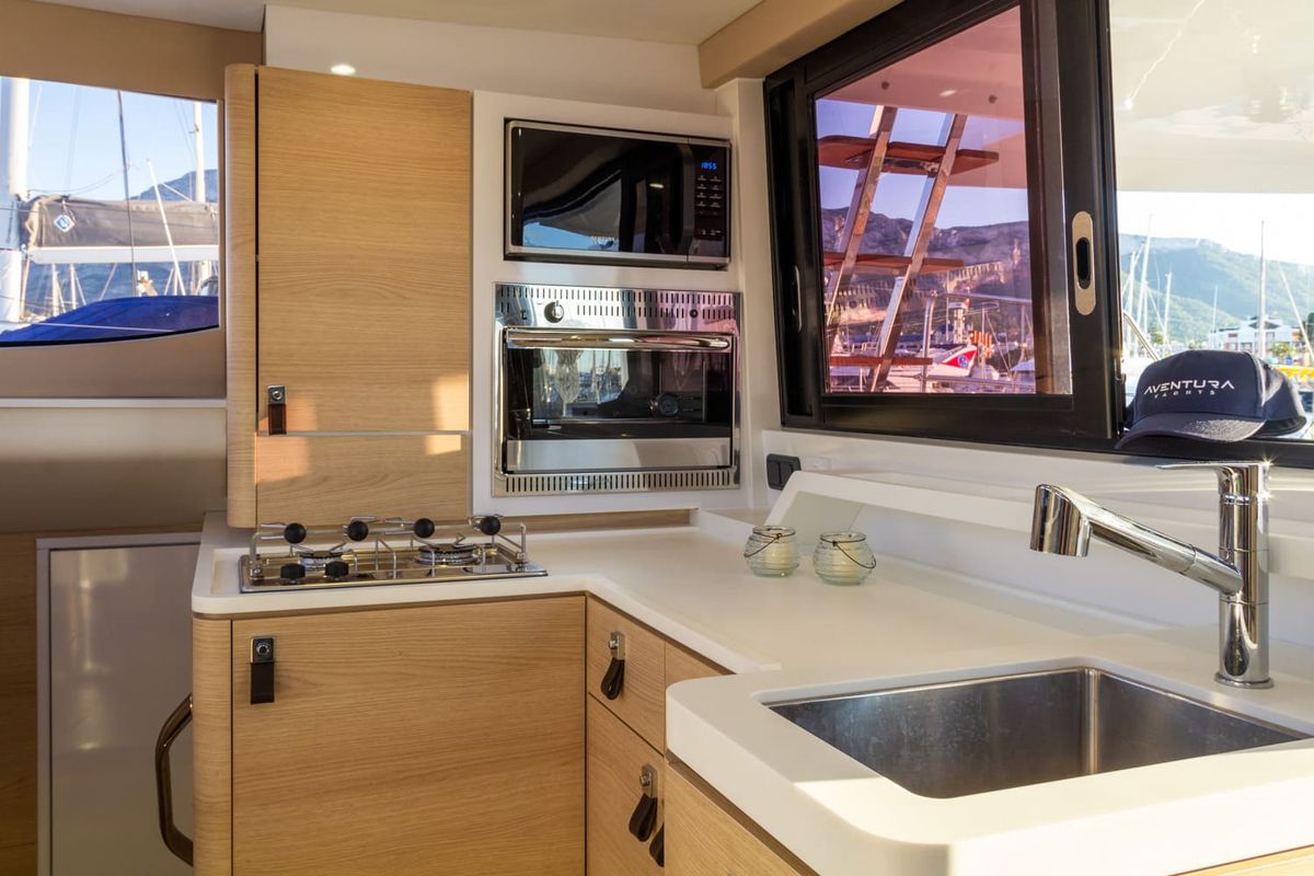 Galley of Flor de Ibiza, a Aventura Catamarans Aventura 37 catamaran at Dénia, Spain