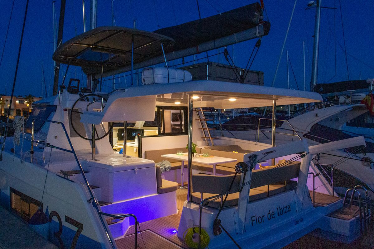 Exterior view of Flor de Ibiza, a Aventura Catamarans Aventura 37 catamaran at Dénia, Spain