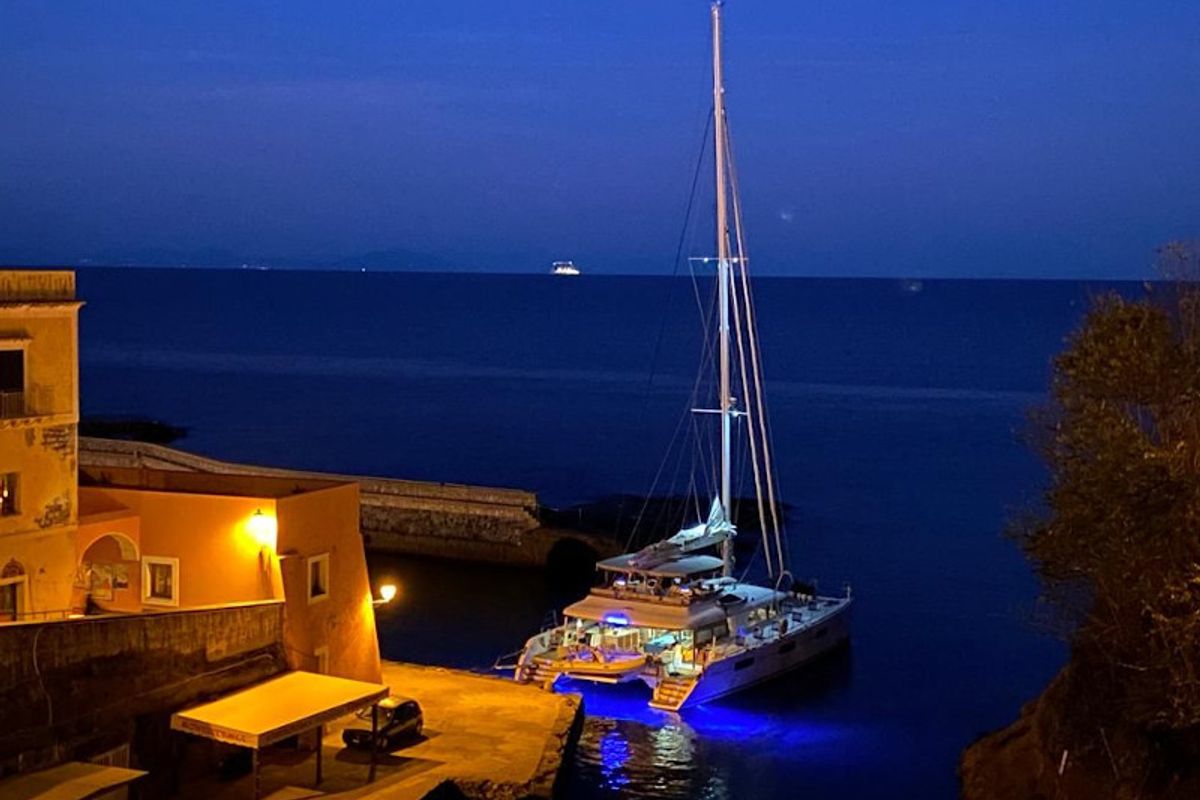 Exterior view of Lady Rachel, a Lagoon 620 catamaran at Capo d'Orlando, Italy