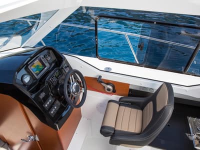 Cockpit of Merry Fisher 795, a Jeanneau Merry Fisher 795 motorboat at Grad Trogir, Croatia