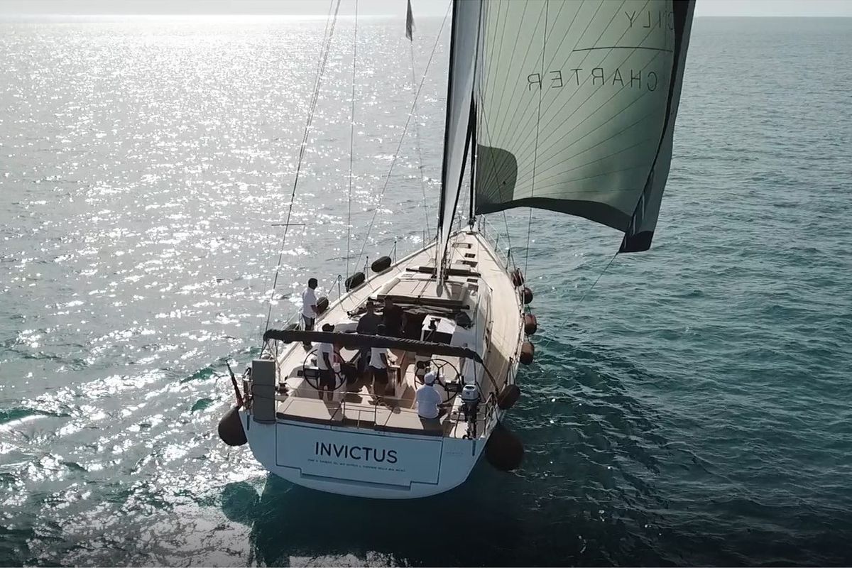 Exterior view of INVICTUS, a Dufour 56 Exclusive sailboat at Capo d'Orlando, Italy
