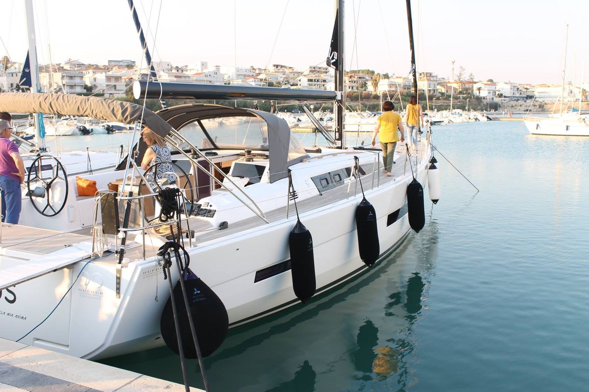 Exterior view of INVICTUS, a Dufour 56 Exclusive sailboat at Capo d'Orlando, Italy