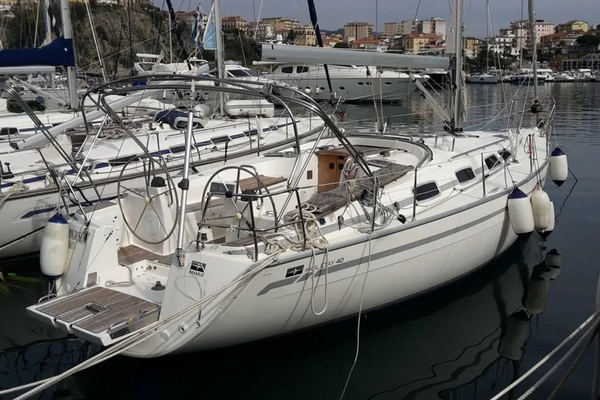 Exterior view of Springrose, a Bavaria 40 Cruiser sailboat at Rodi Garganico, Italy
