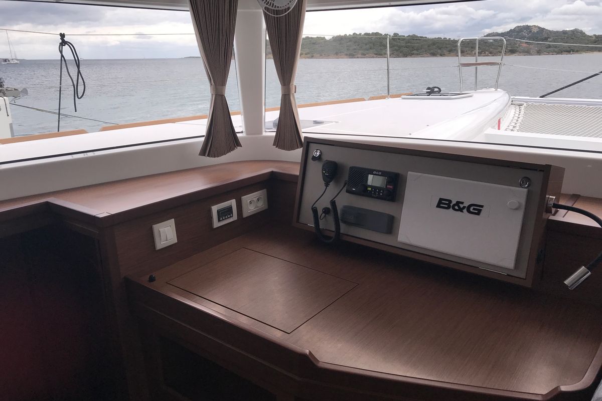 Salon of Rigel Kentaurus, a Lagoon 450 Fly catamaran at Olbia, Italy