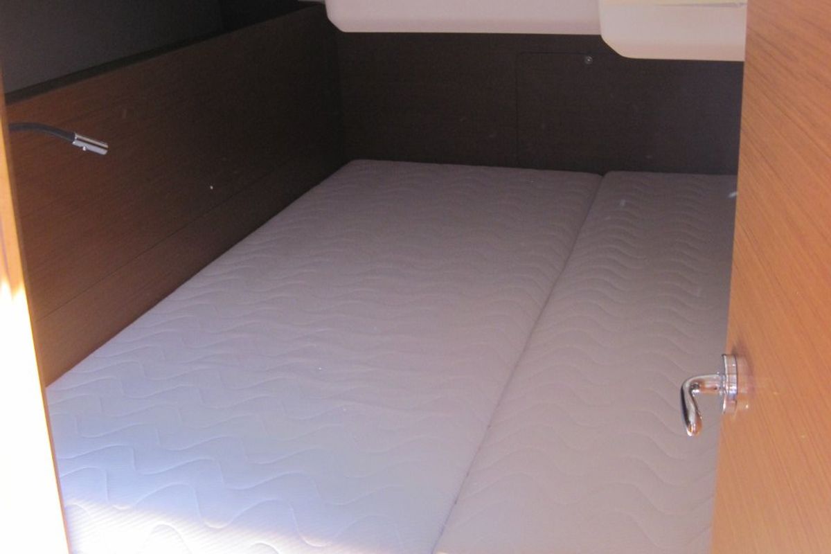 Cabin on Erminia, a Jeanneau Sun Odyssey 440 sailboat at Capo d'Orlando, Italy