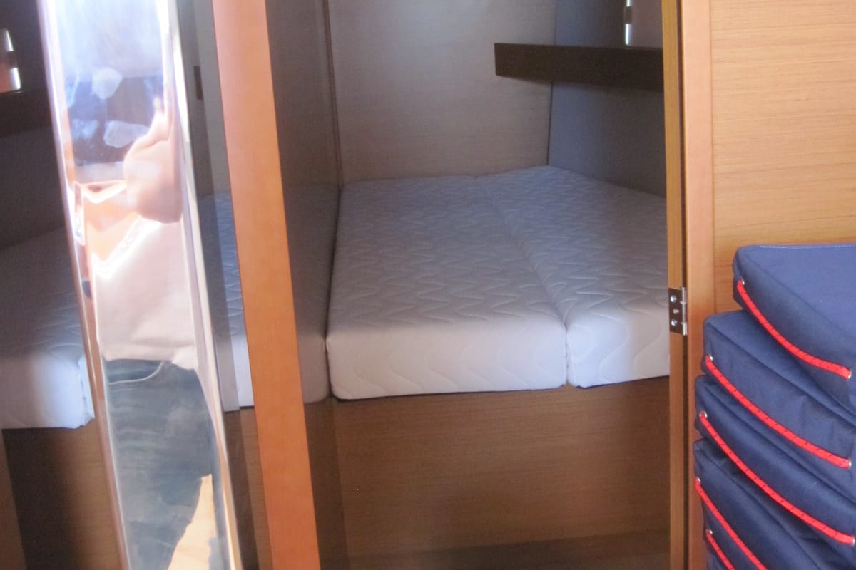 Cabin on Erminia, a Jeanneau Sun Odyssey 440 sailboat at Capo d'Orlando, Italy
