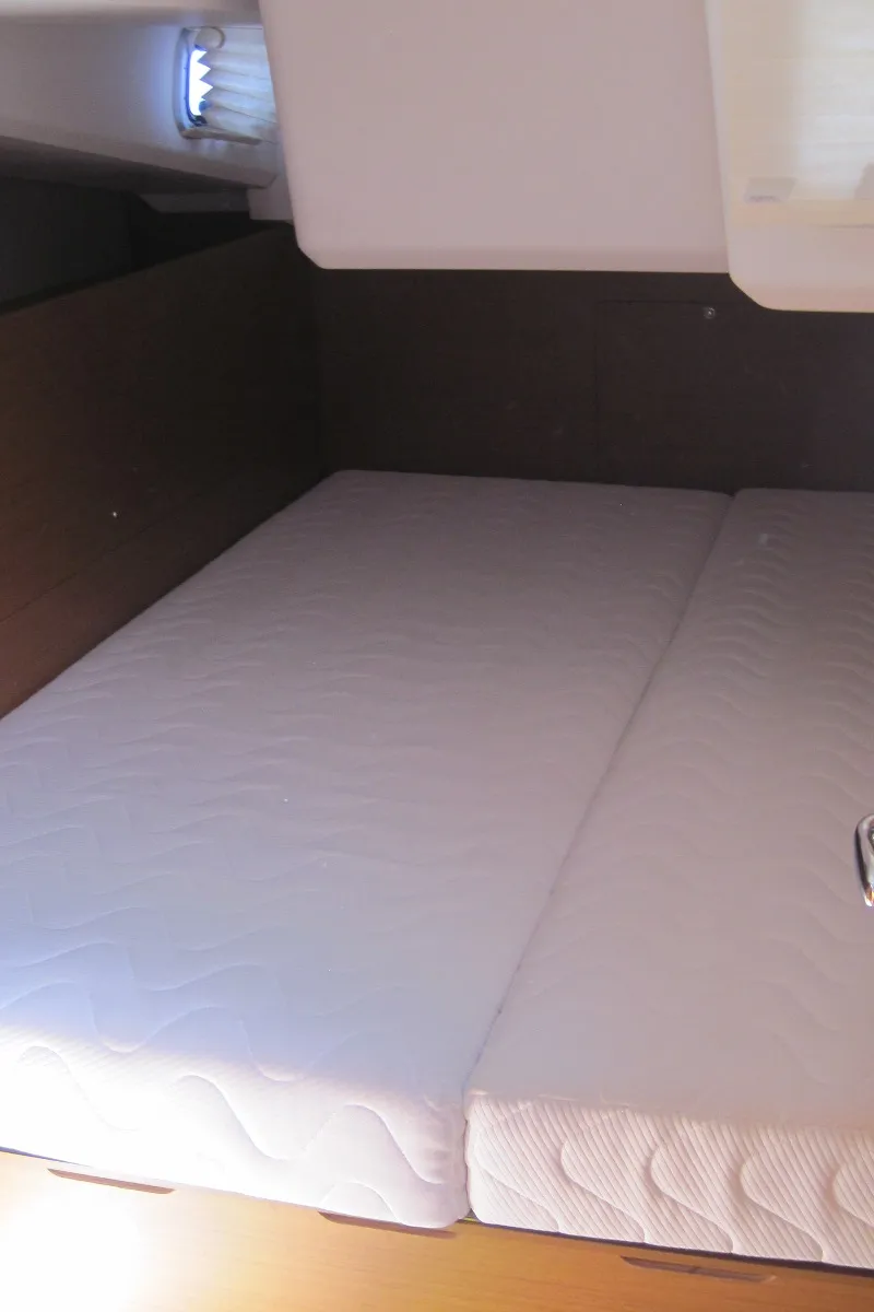 Cabin on Erminia, a Jeanneau Sun Odyssey 440 sailboat at Capo d'Orlando, Italy