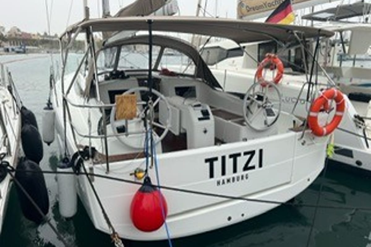 Exterior view of Titzi, a Jeanneau Sun Odyssey 410 sailboat at Palma de Mallorca, Spain