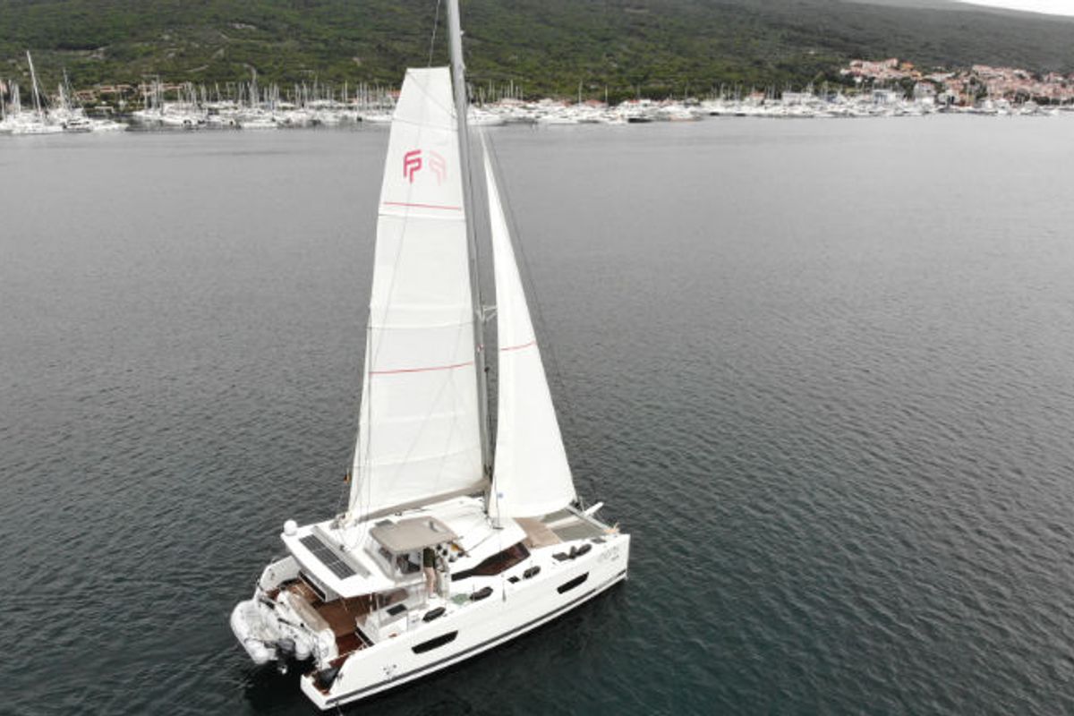 Exterior view of Idefix, a Fountaine Pajot Lucia 40 catamaran at Općina Rogoznica, Croatia