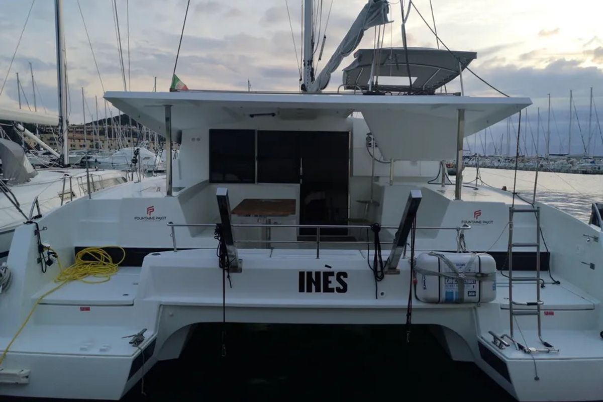 Exterior view of Ines, a Fountaine Pajot Lucia 40 catamaran at Olbia, Italy