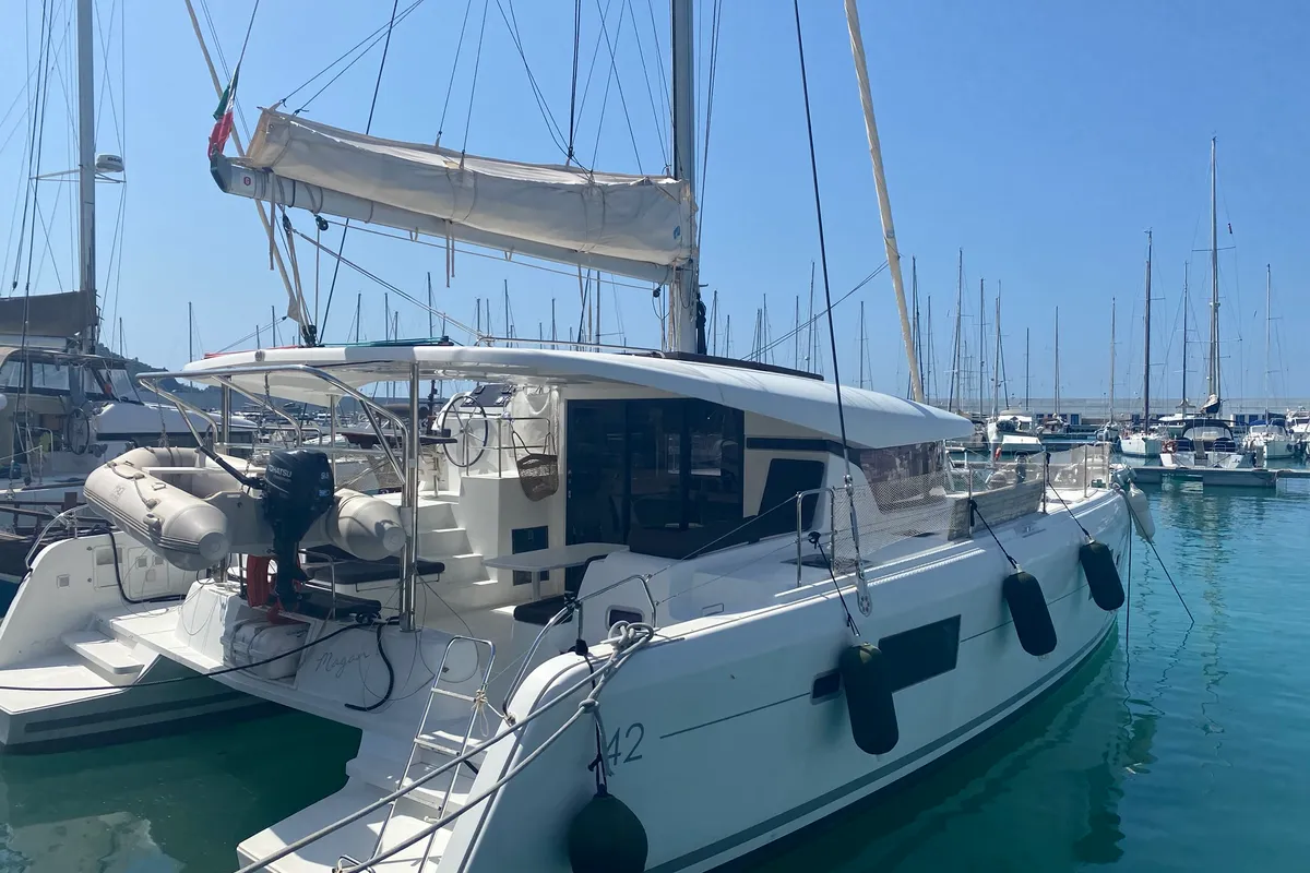 Exterior view of MAGAN 1 WATER MAKER - PANNELS , a Lagoon 42 catamaran at Capo d'Orlando, Italy
