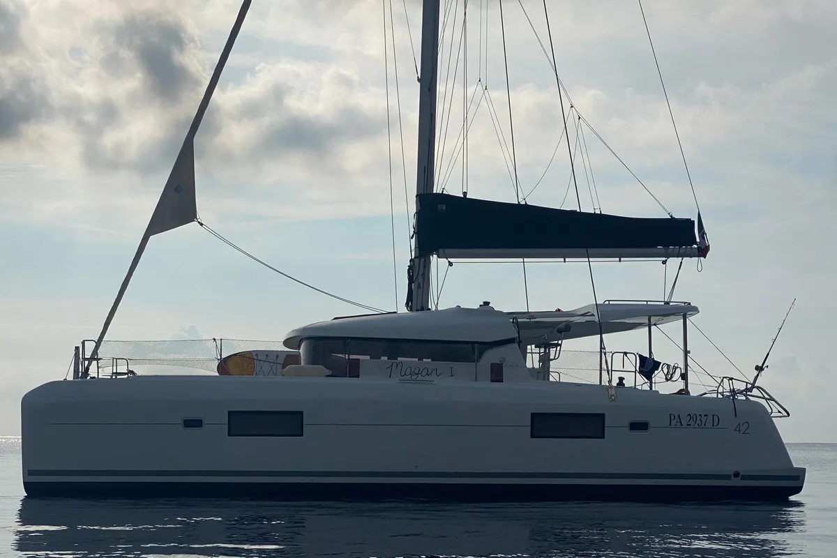 Exterior view of MAGAN 1 WATER MAKER - PANNELS , a Lagoon 42 catamaran at Capo d'Orlando, Italy