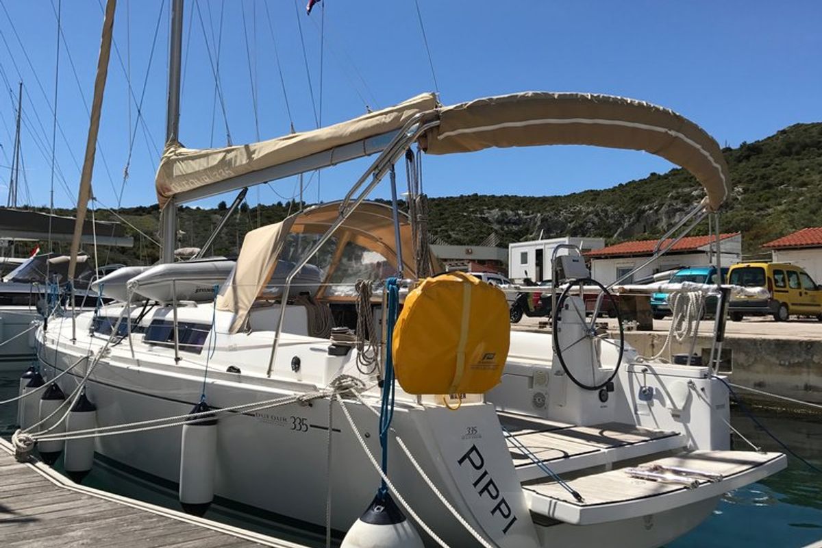 Exterior view of Pippi, a Dufour 335 GL sailboat at Primošten, Croatia
