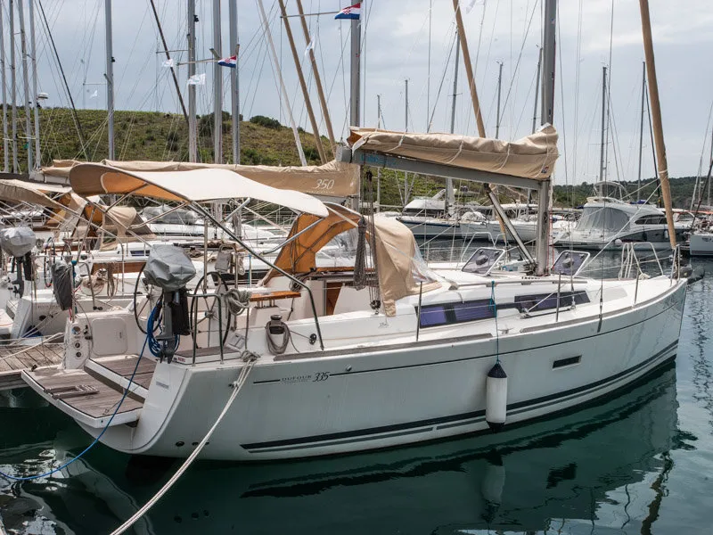 Exterior view of Pippi, a Dufour 335 GL sailboat at Primošten, Croatia