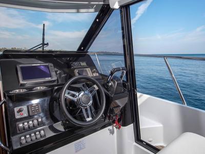 Cockpit of Sea King, a Jeanneau Merry Fisher 1095 Fly motorboat at Grad Pula, Croatia