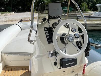 Cockpit of 09, a Joker Jokerboat Wide 520 motorboat at Grad Trogir, Croatia